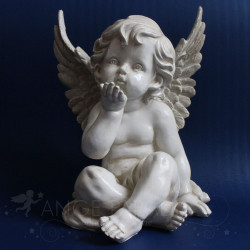 estatua ángel casa