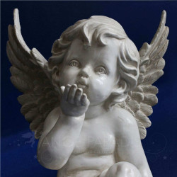 ángel estatuilla casa del mundo