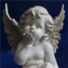 ángel estatuilla casa del mundo