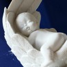 Estatuilla PLUMAS BEBÉ 20CM IZQUIERDA