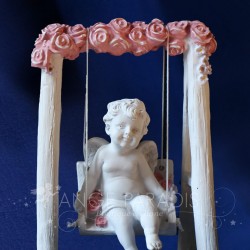 figura ángel color niño swing