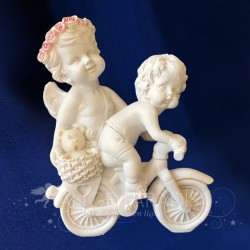 DOS ÁNGELES CON UNA BICICLETA