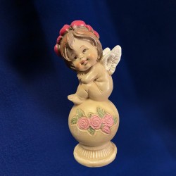 estatuilla de angelito