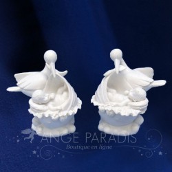 figura de cigüeña ángel bebé