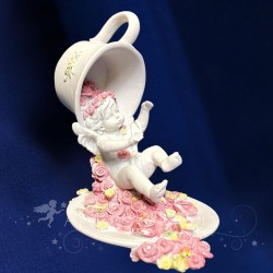 estatuas ángeles taza