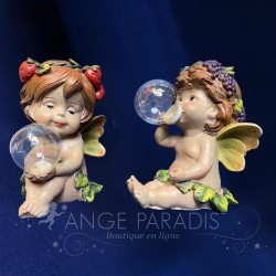 estatuillas de ángel de colores